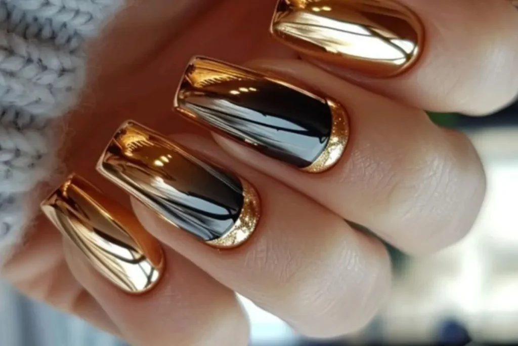 Unhas cromadas dourado com preto