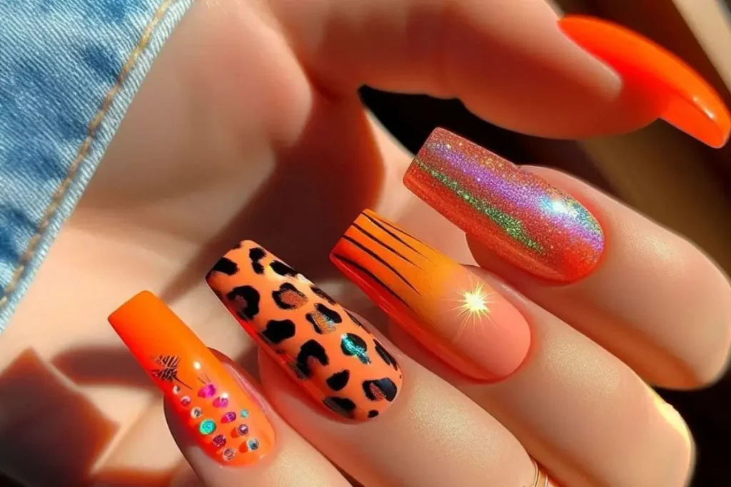 Unhas cor de laranja decoradas